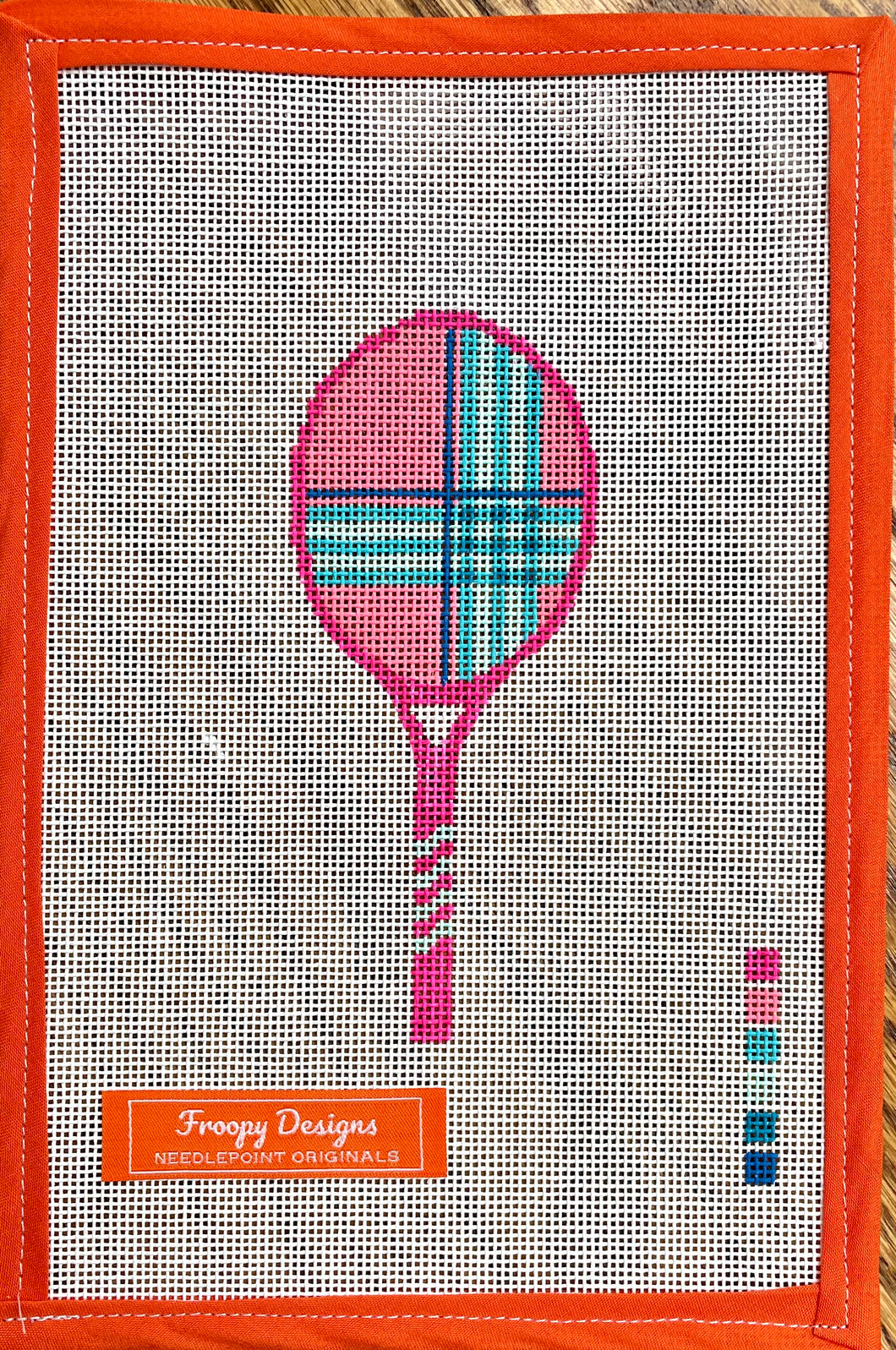 “LILLY PINK RACKET”,  2” x 5” on 18 mesh